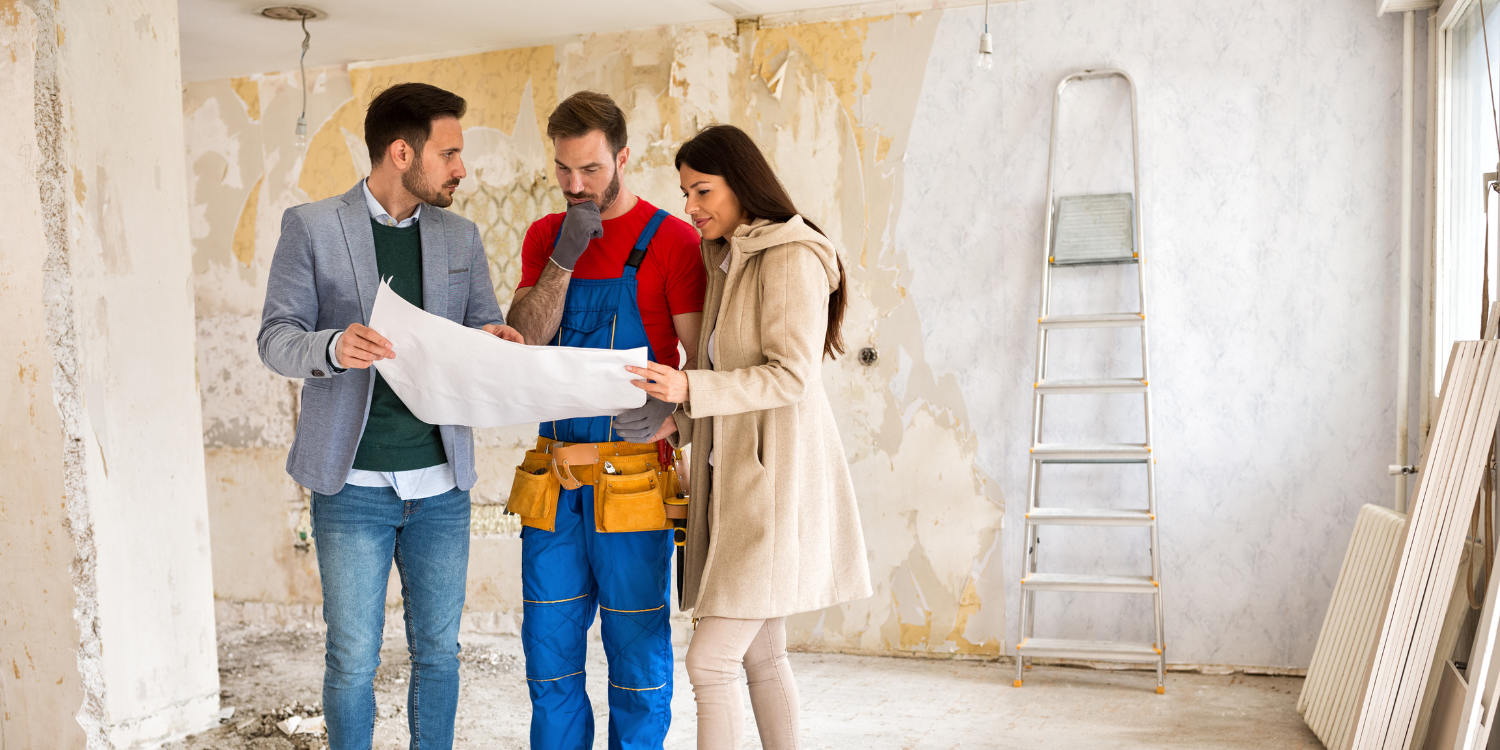 Young couple shows to builder handyman problem about renovations their home - How To Know If You’ve Hired the Wrong Contractor (and What To Do About It)