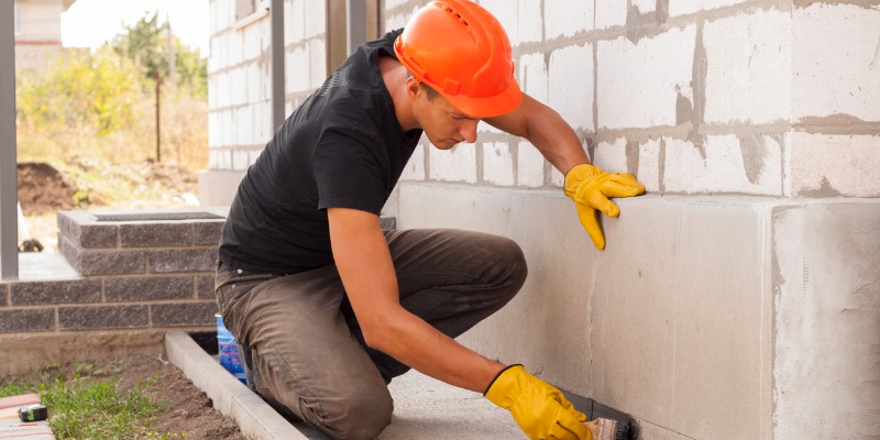 concrete contractor smoothing foundation