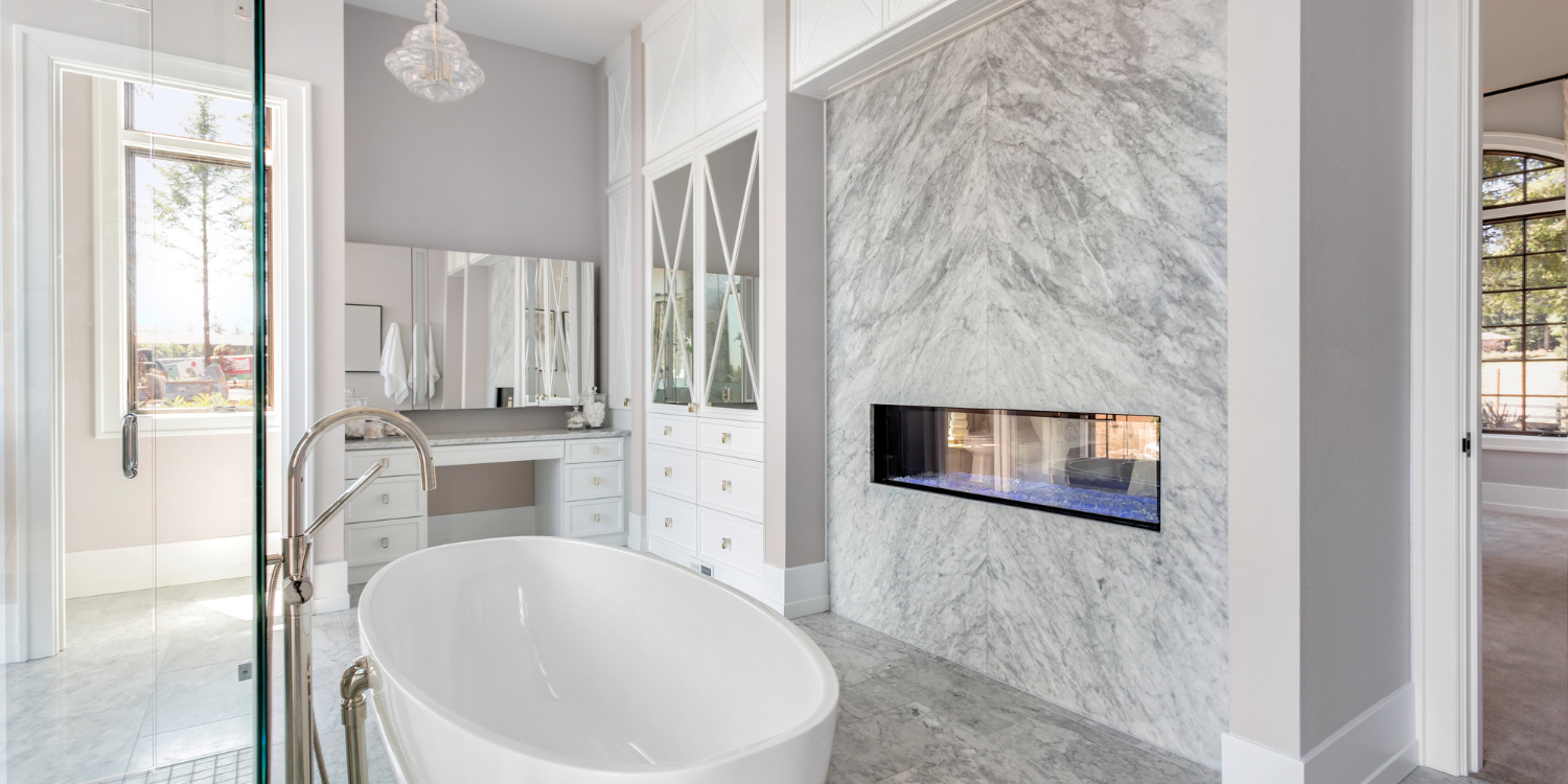 Master Bathroom with fireplace in white - Spring For These 5 Bathroom Renovation Ideas