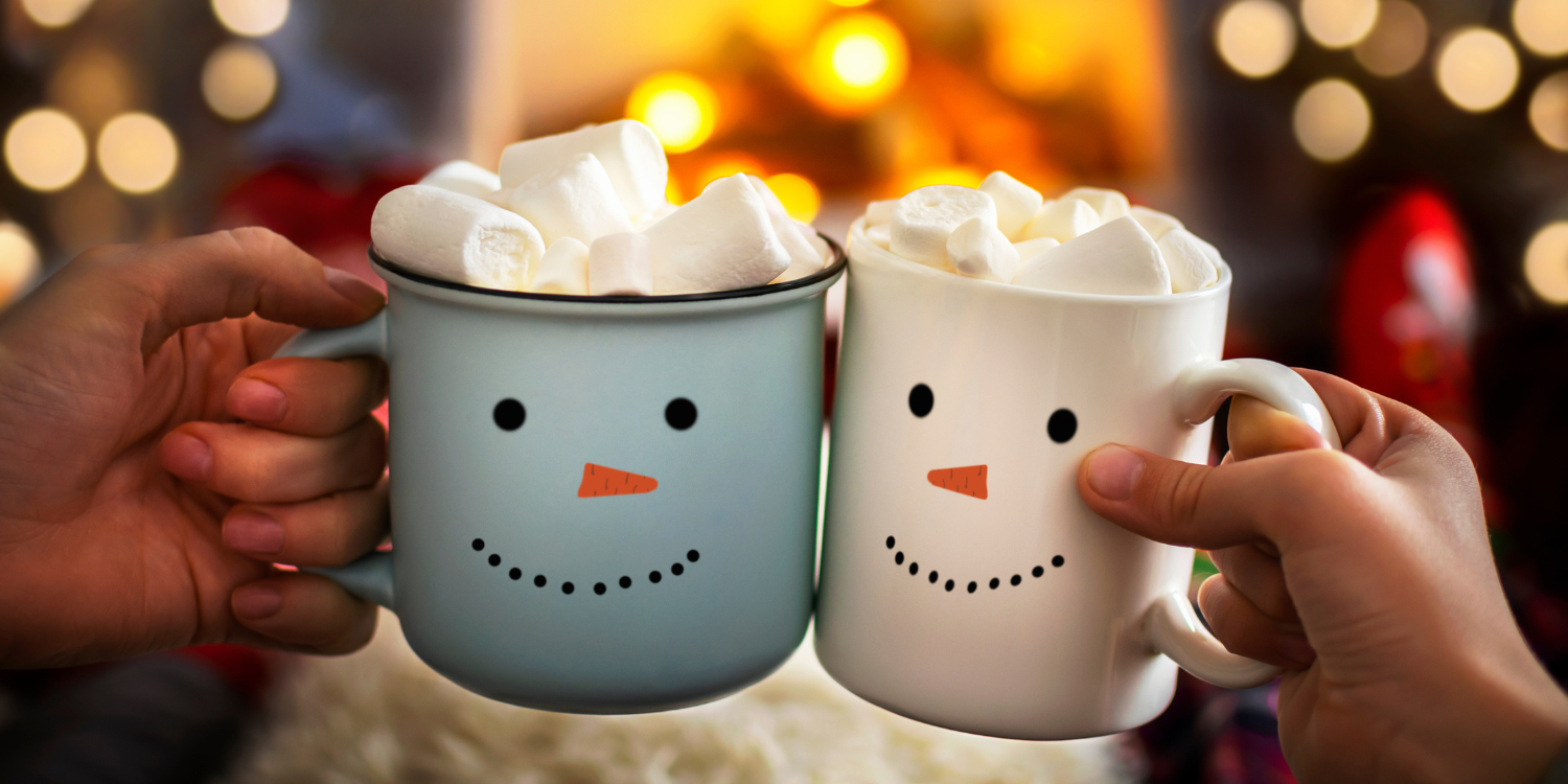 Two people enjoying hot chocolate - 5 Top Tips for Moving in the Winter