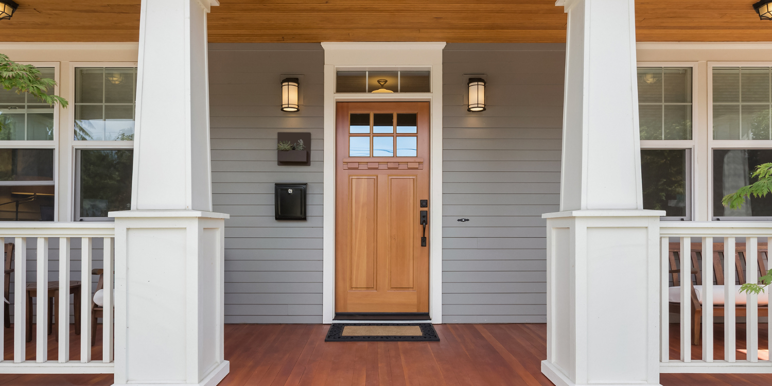 Front door and covered porch - 3 Benefits of Replacing Your Front Door