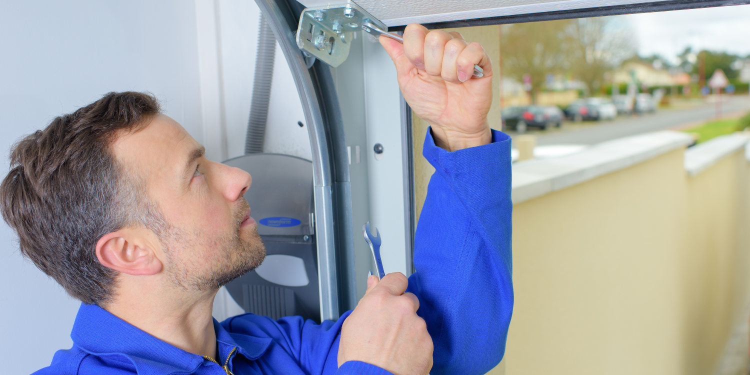 Technician Installing a Garage door - Wondering How to Install a New Garage Door? Here are 5 Professional Options